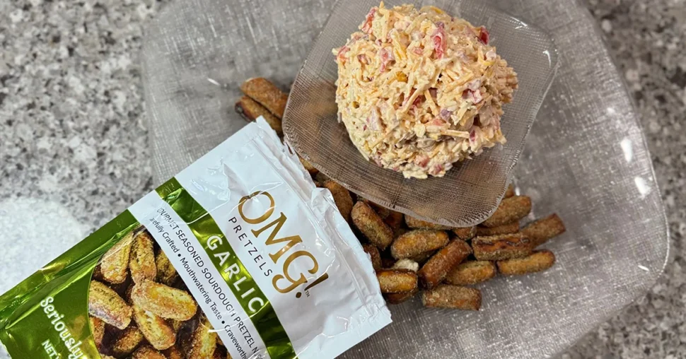 Onigos® spicy sweet potato chips in a colorful bag, showcasing a crunchy snack with a blend of sweet and spicy flavors.